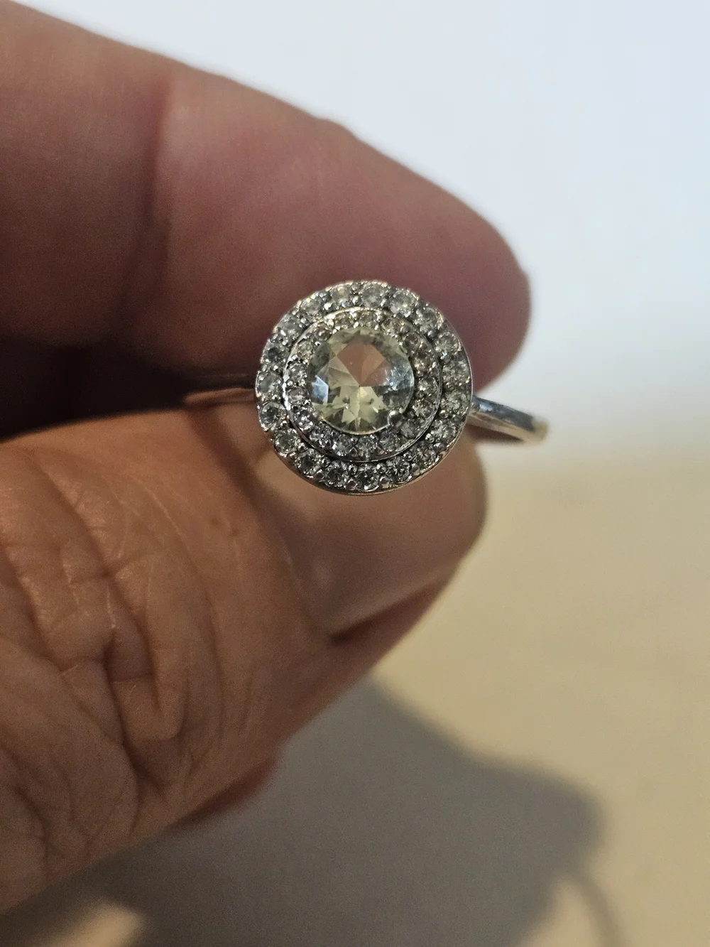 Bomb Party Silver Halo Ring with Pale Green Center Stone